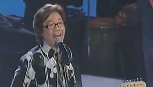 谭咏麟《陪着她》