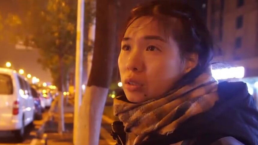 代驾司机黄海艳享受着热闹的长沙带给她的生活希望