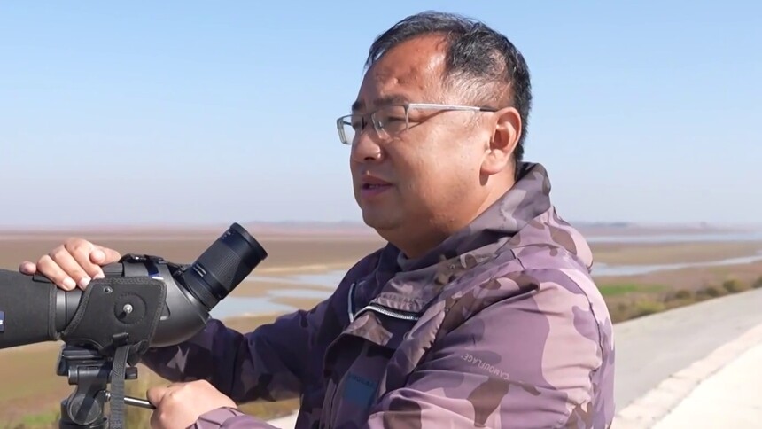 高翔：“聚焦”候鸟 行走在鄱阳湖上的“鸟百科”