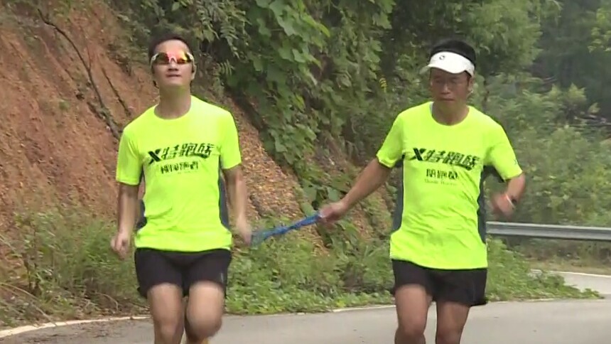 我是你的眼 带你圆梦马拉松 七年如一日 文光明成14位视障跑者最信赖“领跑人”