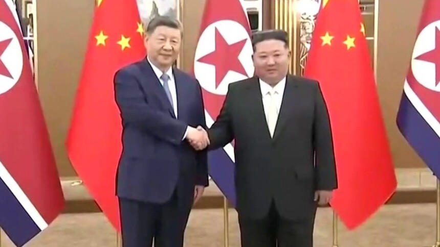 习近平同金正恩举行会谈