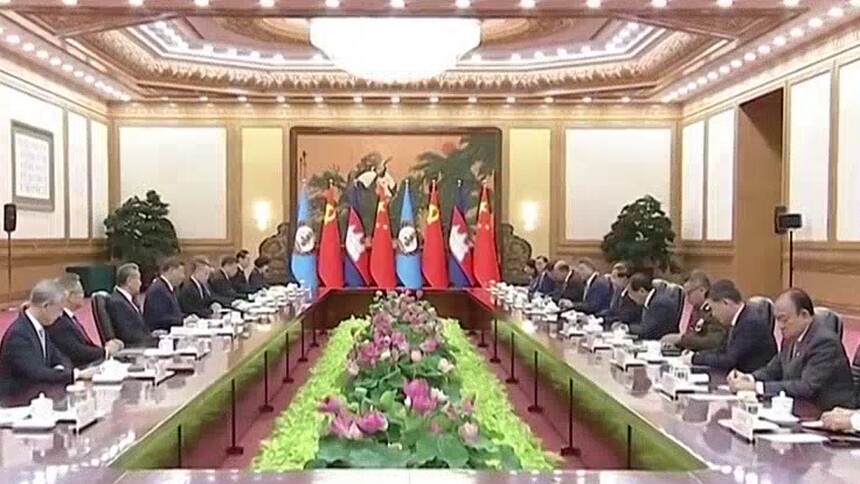 习近平会见柬埔寨人民党主席、参议院主席洪森